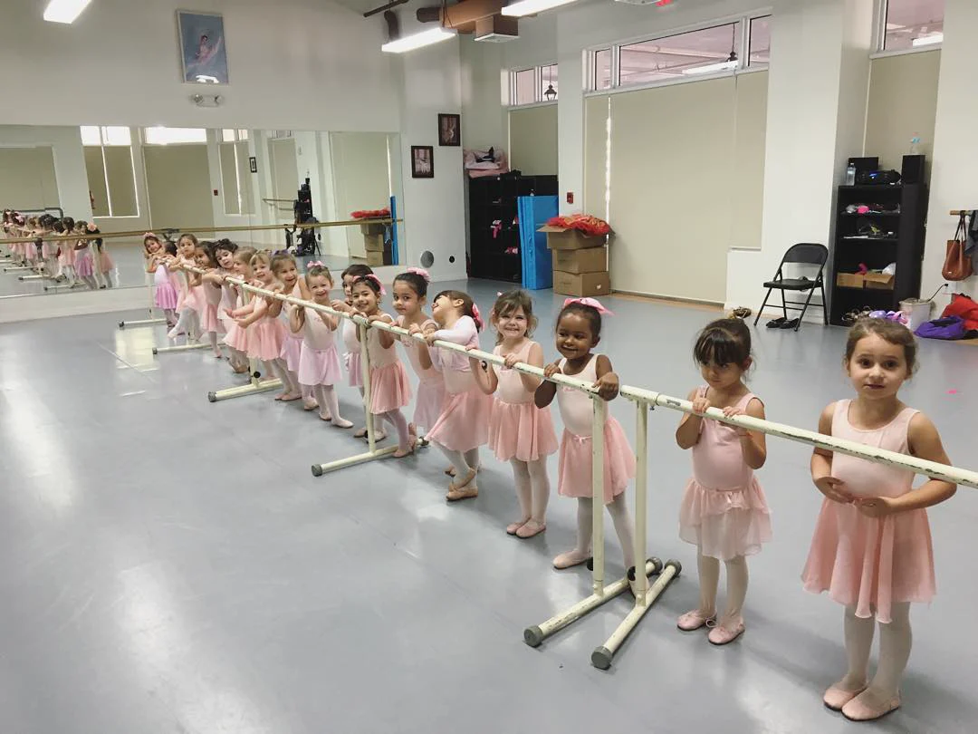 Young ballet students at the barre at Miami Royal Ballet